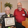 President Lannin presents outgoing President Pat Rand with Certificate of Appreciation...
